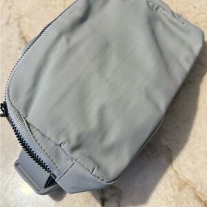 Gray hip Pack / Fanny Pack Bag new with original bag